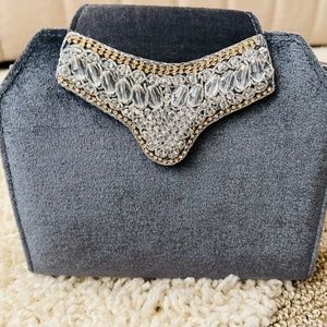 Beaded velvet clutch